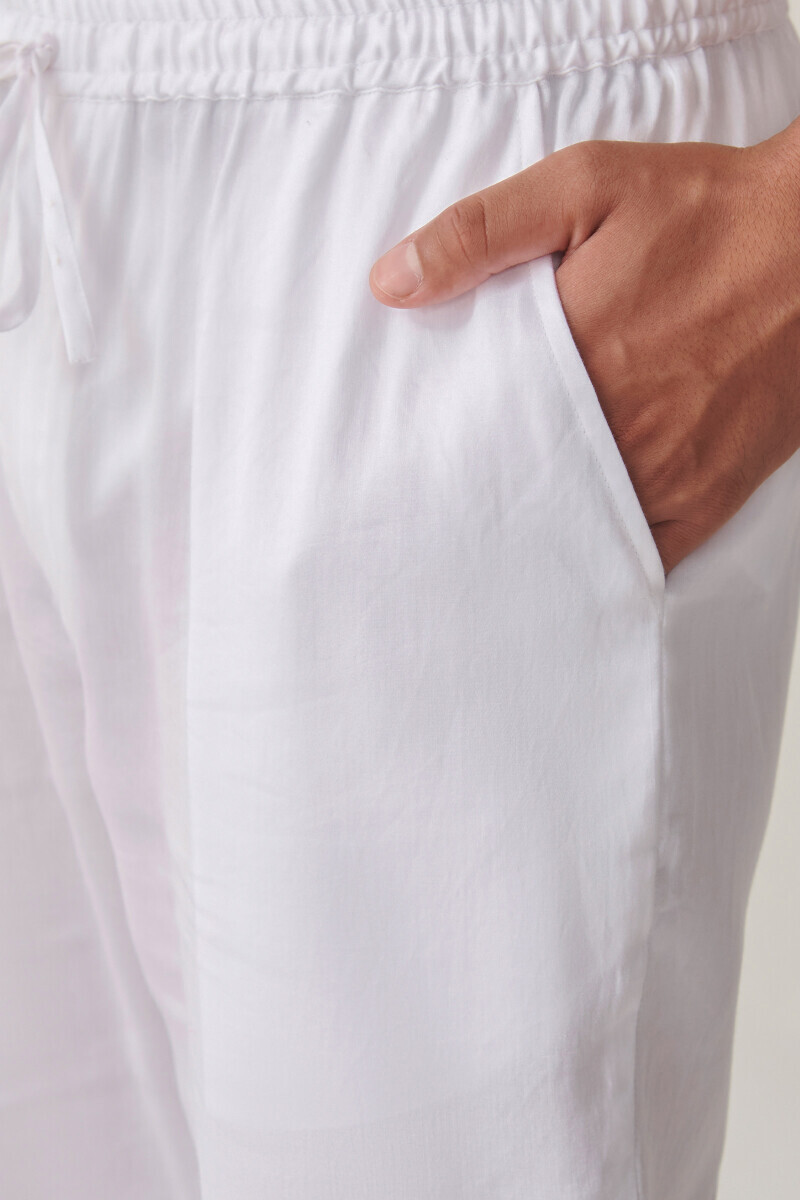 White Handcrafted Cotton Narrow Pants